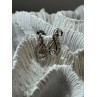 INTERWOVEN 925 STERLING SILVER WHITE TOPAZ EARRINGS LENGTH 0.6 in