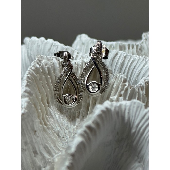 INTERWOVEN 925 STERLING SILVER WHITE TOPAZ EARRINGS LENGTH 0.6 in