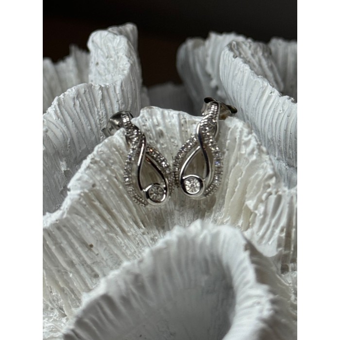 INTERWOVEN 925 STERLING SILVER WHITE TOPAZ EARRINGS LENGTH 0.6 in