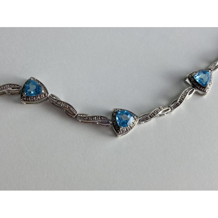 925 STERLING SILVER BLUE TOPAZ BRACELET SIZE 7 IN