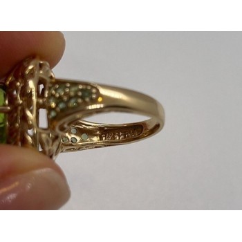 14K YELLOW GOLD  & PERIDOT RING  SIZE 4.5